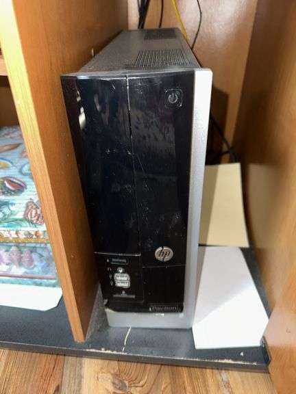 HP Pavillion computer with screen, mouse and keyboard, office supplies image
