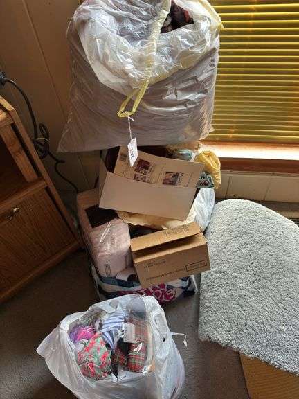 Lot of material, rugs, new depends, deep heat massager image