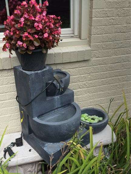 Outdoor fountain with begonia. I’m working condition image