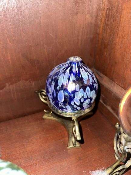 Blown glass candle holders, brass stands, clear glass ball