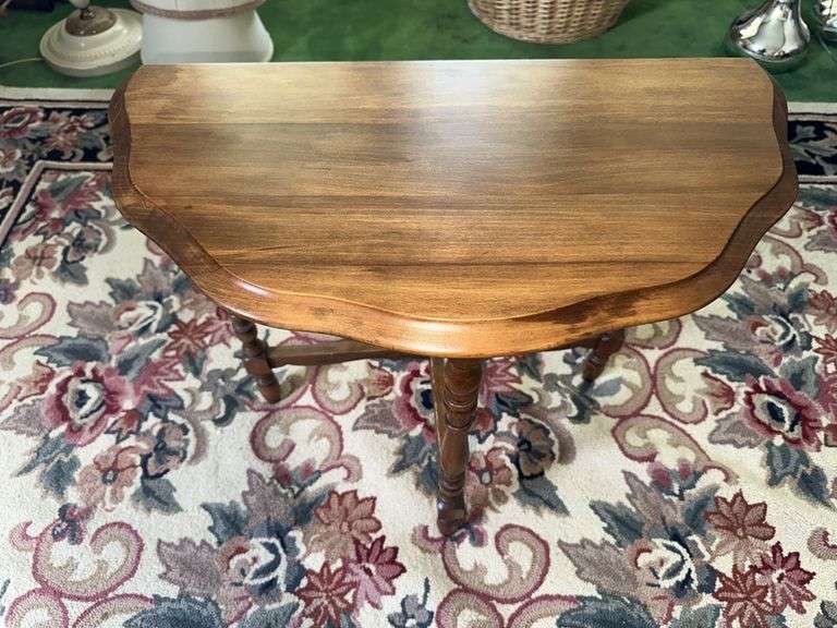 Half round table with scalloped edge