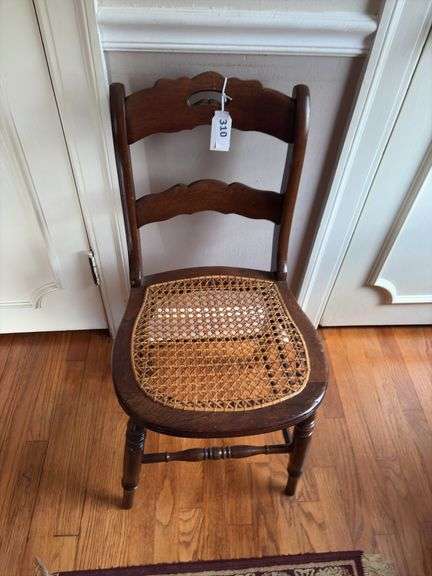 Antique walnut chair w/ cane seat image