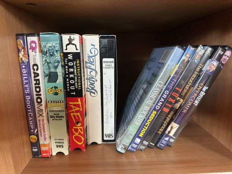 Lot of fitness VHS tapes and CD’s, leg weights, massager image