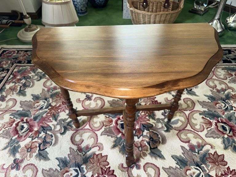 Half round table with scalloped edge