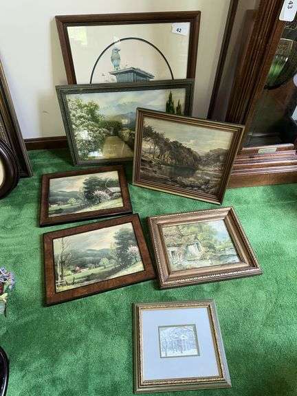 Lot of landscape themed framed pictures