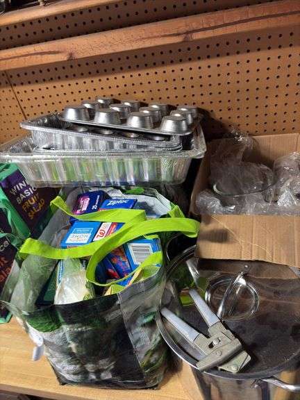 Stock pot, plastic containers, stand mixer, kitchen storage items image