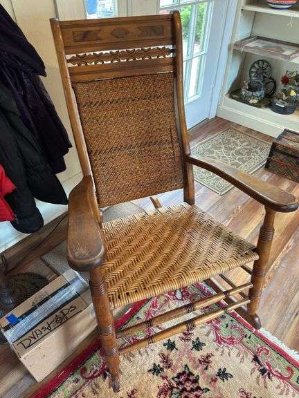 Antique wicker seat rocker image