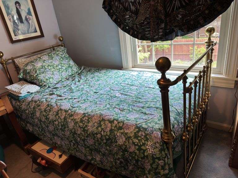 Twin size brass bed with bedding image