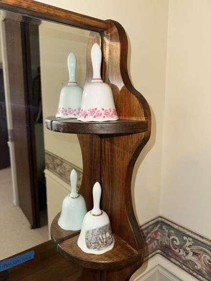 Porcelain dresser box, 2 perfume bottles (one has broken stopper), brass bell, 2 china bells, candle