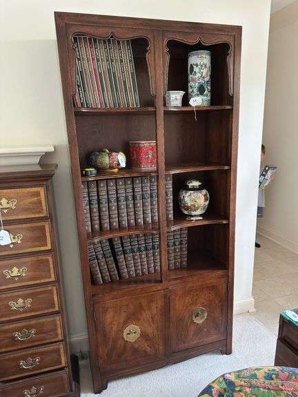 Vintage wooden bookshelf with cabinet doors on bottom image