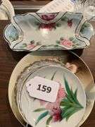Hand painted porcelain plates, saucers, bone dishes