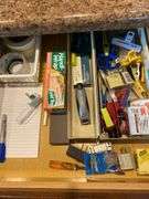 3 kitchen drawers utensils and miscellaneous, rug