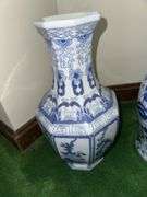 Blue and white painted garden stool 11.5” tall, blue and white vase 14.5” tall