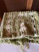 Roll around cabinet, tablecloths, rug, towel
