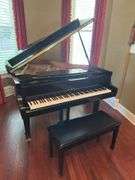 Yamaha Baby Grand Piano in ebony with piano stool