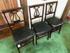 3 antique folding chairs with harp back