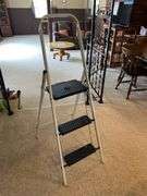 Contents of kitchen closet, step stool, ironing board, brooms, extension cords (excludes items on shelf)