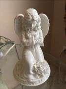 3 angel figures, 1 is a light 12" t