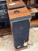 Sound design stereo, wood cabinet, books