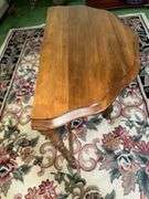 Half round table with scalloped edge