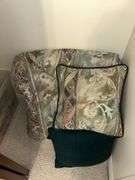 Lot of candles, bedspread with pillows, quilt