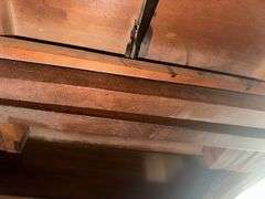 Antique table with built in drop leaf and claw feet and drop down legs