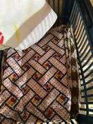 Roll around cabinet, tablecloths, rug, towel