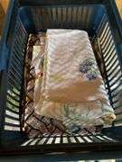 Roll around cabinet, tablecloths, rug, towel