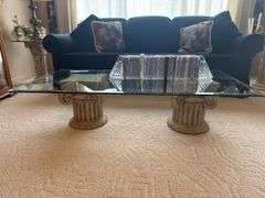 Coffee table with 2 pedestals & glass top 52" x 26" x 14"