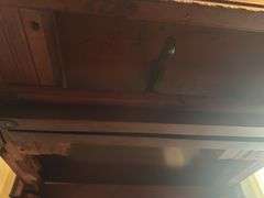 Antique table with built in drop leaf and claw feet and drop down legs