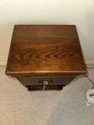 Pair of wooden one drawer side tables