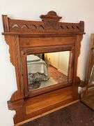 Antique Walnut dresser w /marble top, carved mirror w/ candle shelves