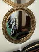 2 round antique framed mirrors
