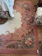 Women 100% wool pile area rug