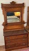 Antique Walnut dresser w /marble top, carved mirror w/ candle shelves