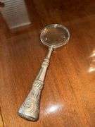 Rococo magnifier with silver finish