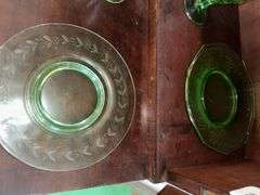 Uranium glass sherbets, stemmed glasses, cup, green depression glass plates, glass