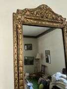 Antique bell pull with cross stitch, ornate framed mirror