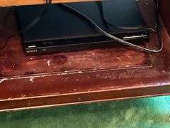 Double door Mahogany cabinet w/ TV, Sony DVD player