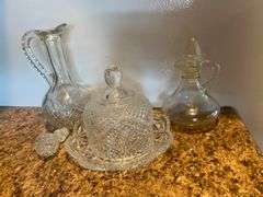 Clear glassware, cake stand, am dessert stand, round butter dish, cruets, bowl