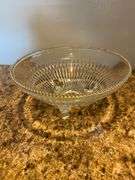Clear glassware, cake stand, am dessert stand, round butter dish, cruets, bowl