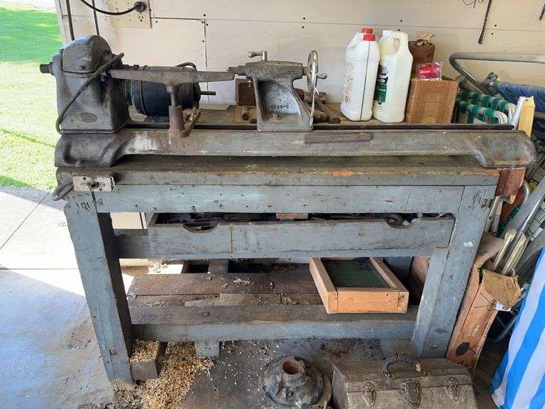 Lathe, bench, and chisels image
