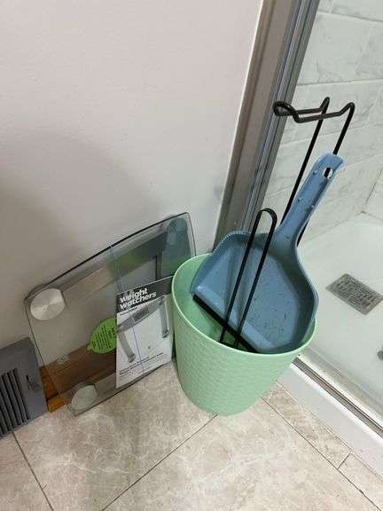 Bathroom scale, clock and wall art image