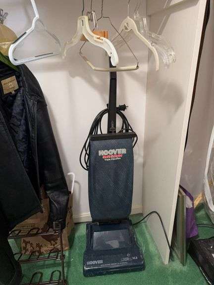 Hoover vacuum, medium leather jacket, Christmas blanket, shoe rack, hangers, miscellaneous ￼ image