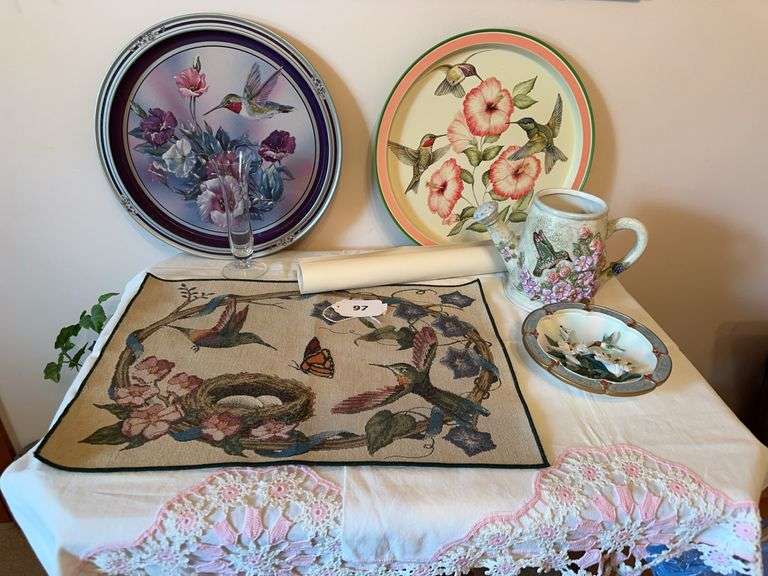 Signed Evelyn Steinkuhl print, Hummingbird serving trays, glass vase, ceramic watering can, plate and table linens image