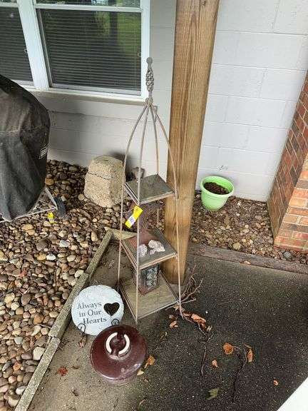 Patio decor table, memory plaque, electrical insulator, iron cross image