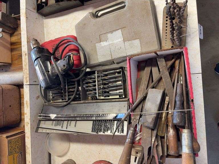 Electric drill, drill bits, driver bits, files image