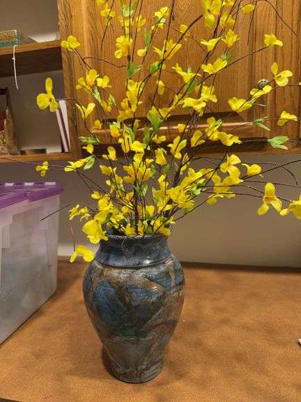 Floral arrangement in vases artificial floral in tub image