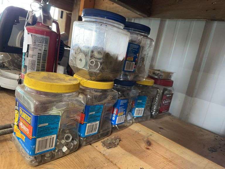 Misc tubs of screws and bolts, fire extinguisher image