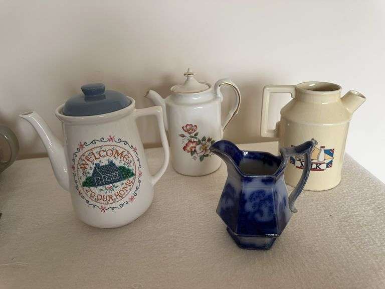 4 pitchers including one flow blue style image